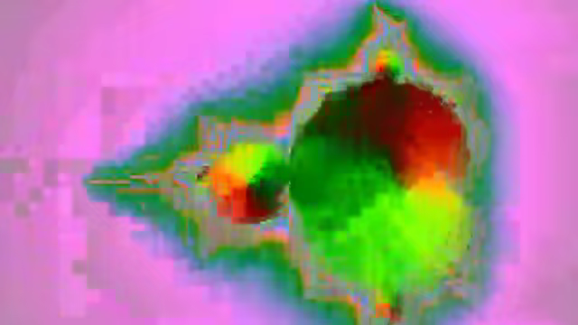 Video frame encoded at a very low bitrate, with visible square blocks and smeared color