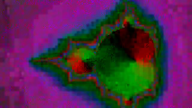 Dark, noisy video frame compressed at a modest bitrate, full of blotchy artifacts